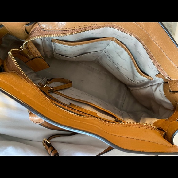 Leather Michael Kors purse in tan.